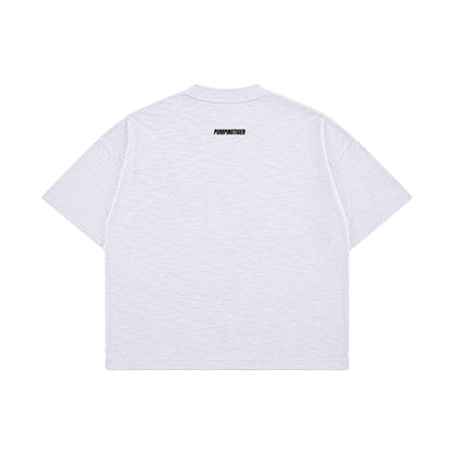 Back view of Minimal Dusty White Boxy Slub Tee with black PUMPINGTIGER wordmark