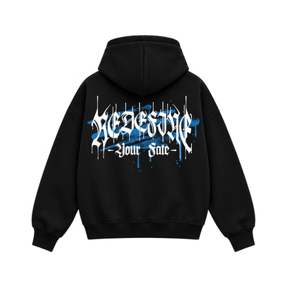Back view of Redefine Your Fate black boxy zipper hoodie with bold white gothic typography and blue graffiti artwork