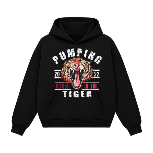 Refuse To Fail black boxy hoodie featuring a fierce tiger graphic and bold PUMPINGTIGER motivational typography