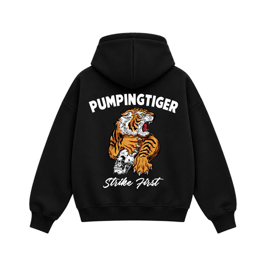 Back view of Strike First black boxy hoodie featuring bold orange tiger and skull artwork with Strike First lettering